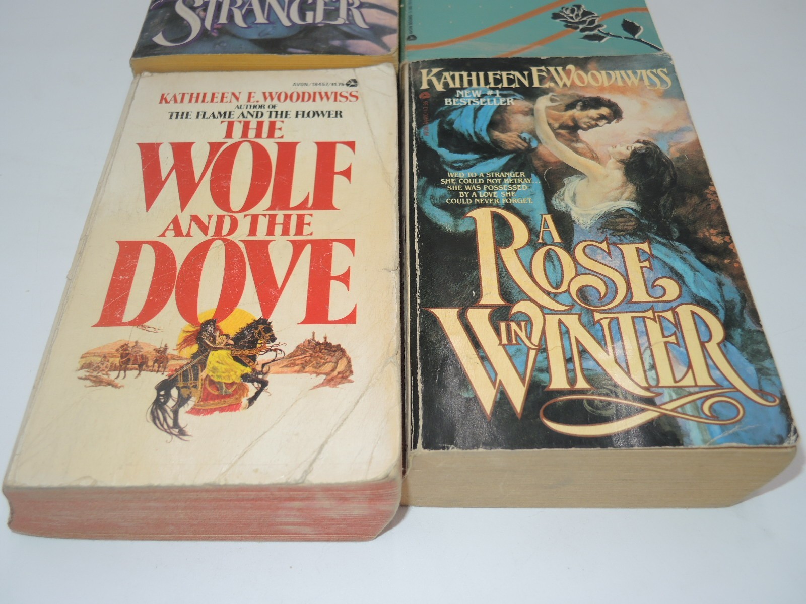 4 by KATHLEEN WOODIWISS Come Love A Stranger The wolf And Dove So Worthy Rose Wi