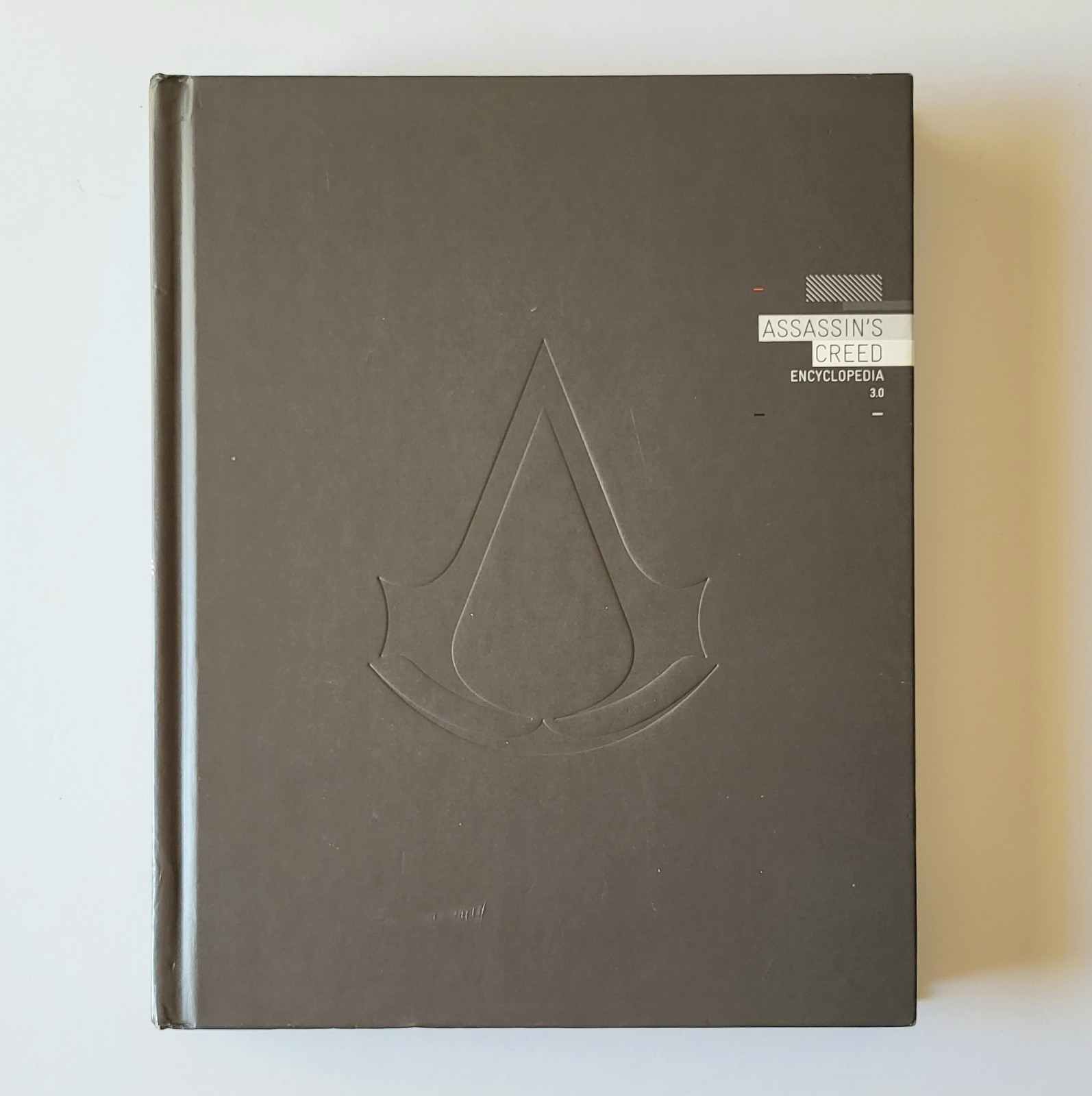 ASSASSIN’S CREED ENCYCLOPEDIA 3.0 2013, HC Video Game Book, Ubisoft VG+ Cond